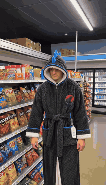 Wearing the Godzilla robe at a convenience store